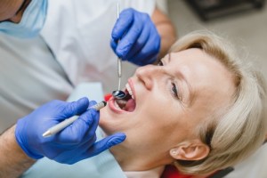woman getting non-surgical root canal